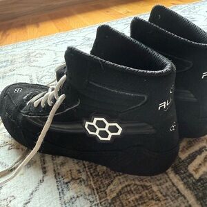 Rudis wrestling shoes, men’s 8.5, in good condition.